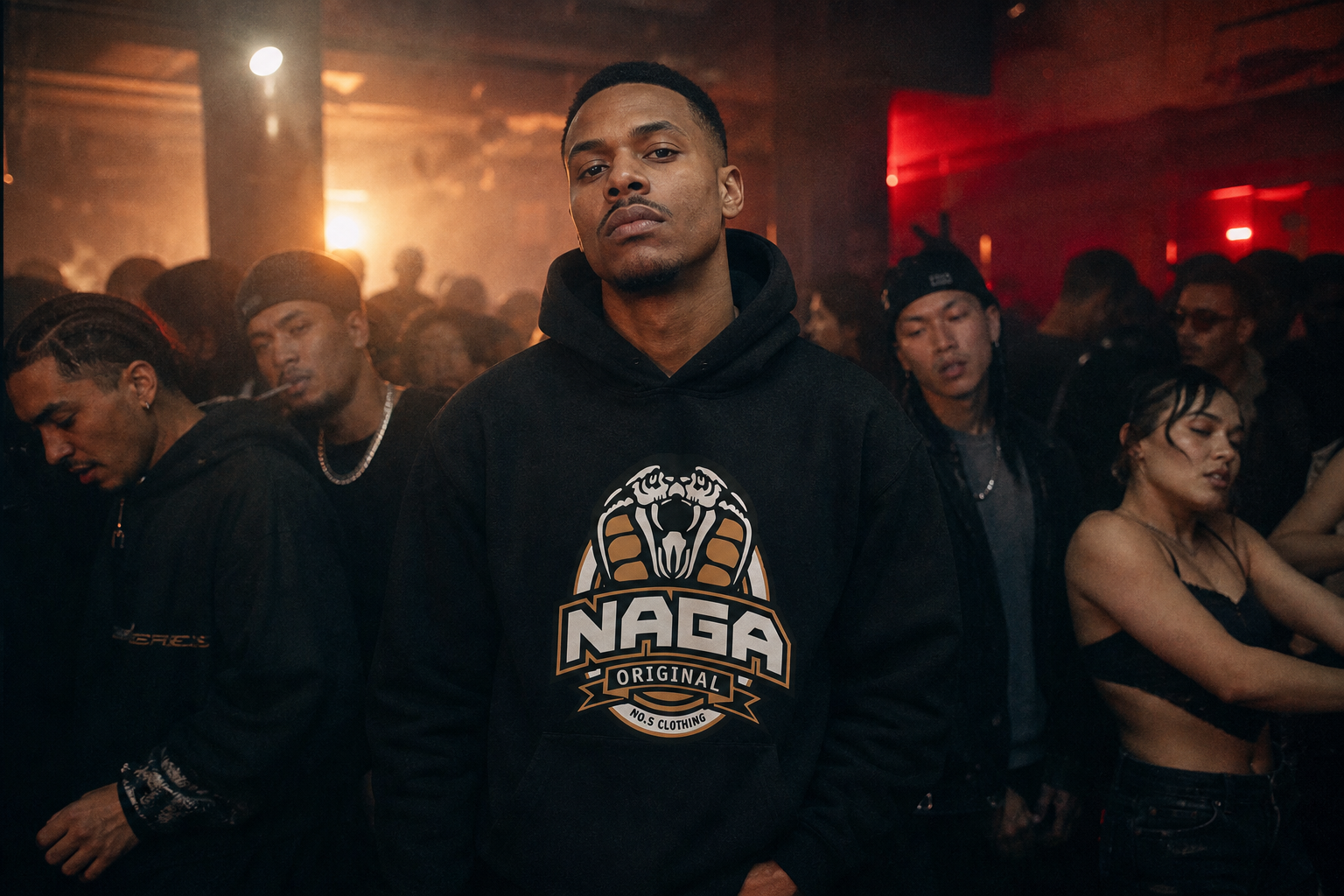 Editorial shot of Naga Original hoodie and cobra logo in a nightlife setting